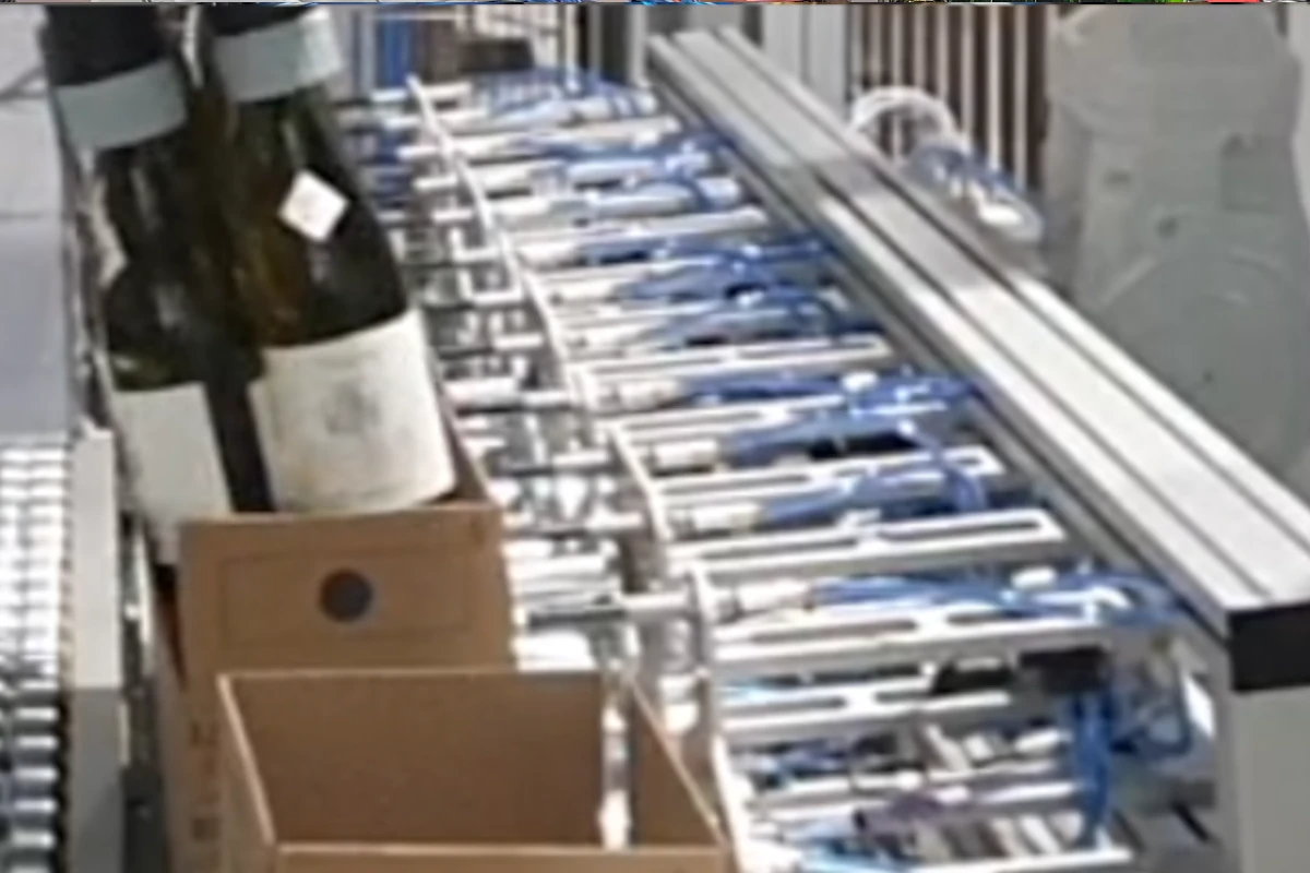 Robot d’encaissage de bouteilles couchées et debout